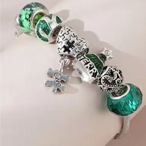 2297-RTT Sparkling Green Beads & Charms “ Missing Puzzle Piece”